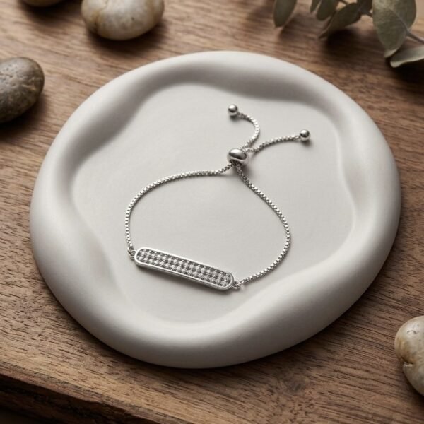 AD Silver Rakhi Bracelet — silver tone bracelet by Priyavi Creation