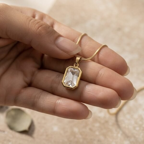 AD White Stone Gold Pendant worn by a model