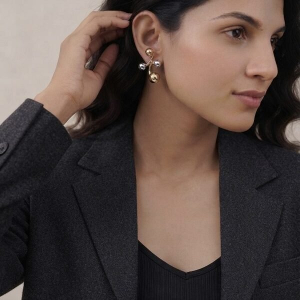 Dual Tone Cluster Earrings worn by a model