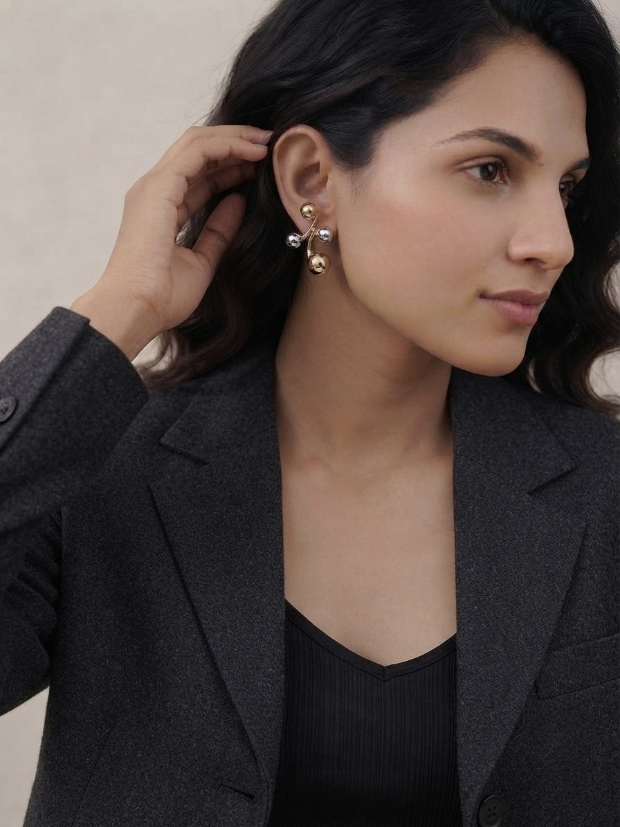 Dual Tone Cluster Earrings worn by a model