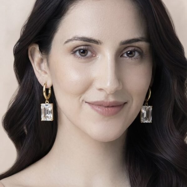 Emerald Cut Crystal Huggie Drop Earrings worn by a model