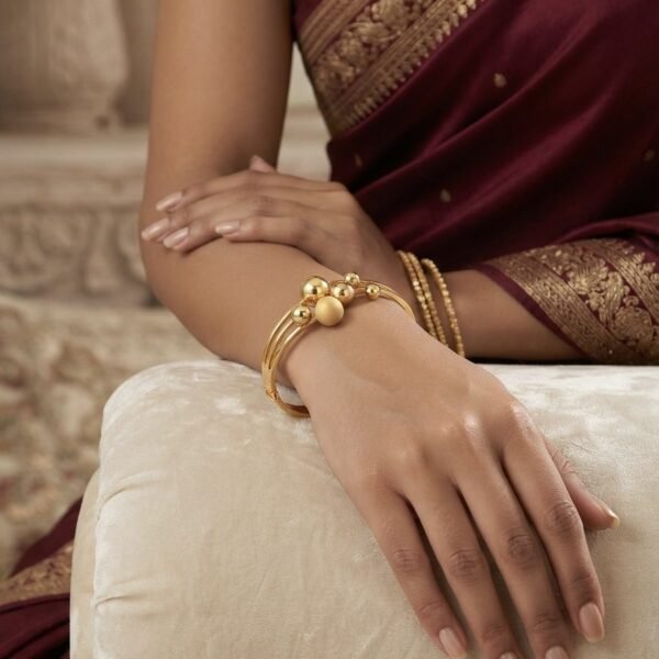 Multi Strand Ball Bead Bangle worn by a model