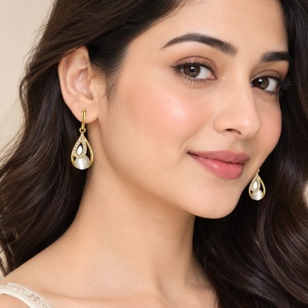 Pave Teardrop Cat Eye Drop Earrings worn by a model