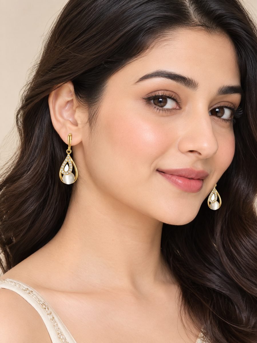 Pave Teardrop Cat Eye Drop Earrings worn by a model