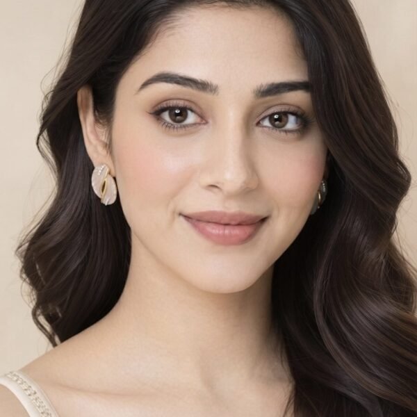 Pearl White Enamel Leaf Stud Earrings worn by a model