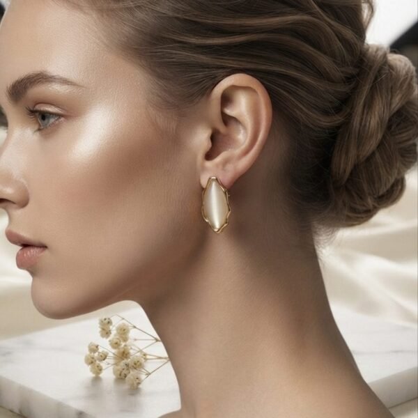 Scalloped Cat Eye Stud Earrings worn by a model