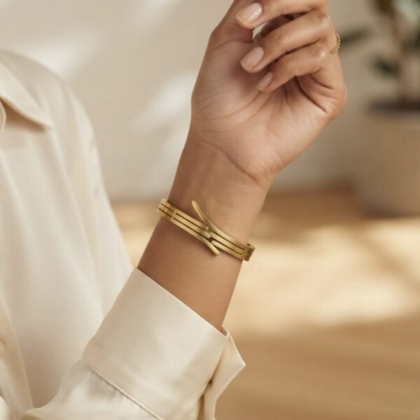 Triple Line Wrap Hinge Bangle worn by a model