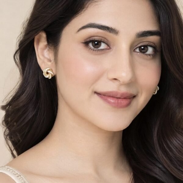 White Enamel Love Knot Stud Earrings worn by a model
